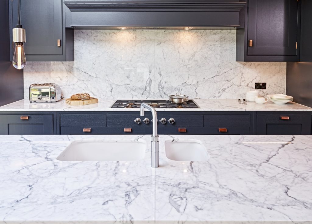 Book-matched Stataurio Marble Worktop with painted Grey Kitchen Cabinets