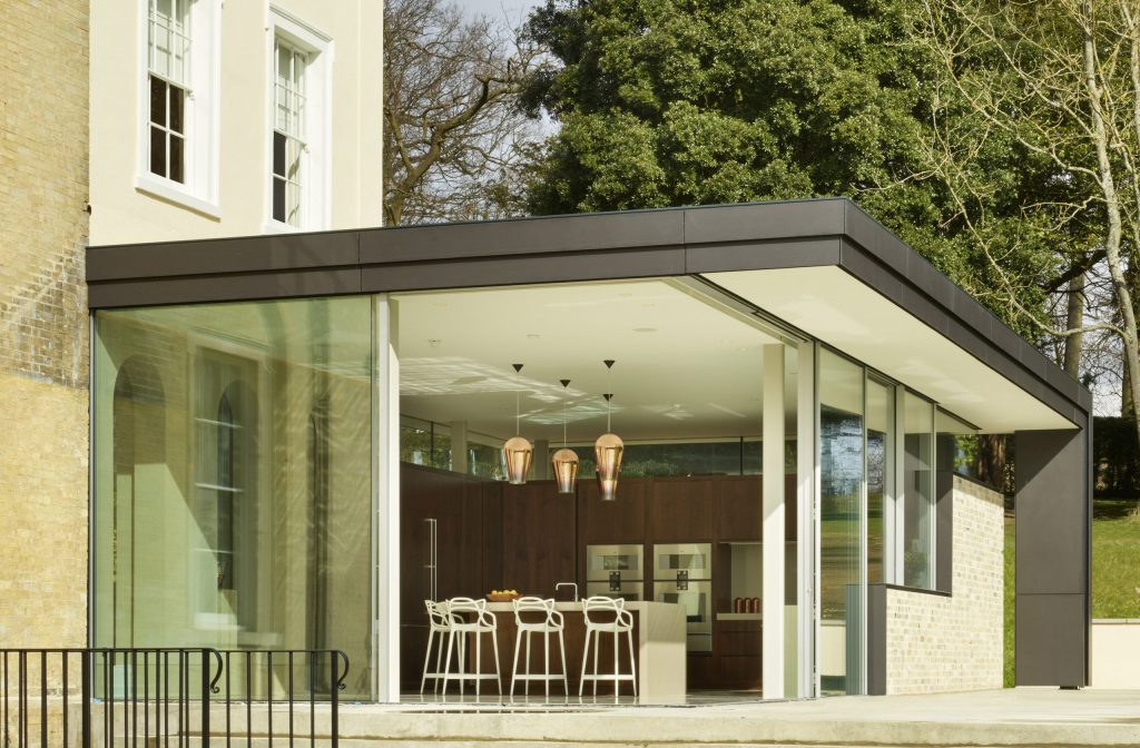 Handleless Kitchen in contemporary Georgian rectory glass extension
