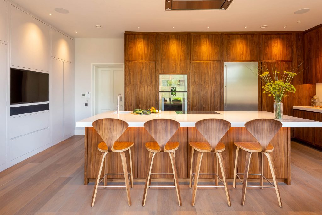 Kitchen Architecture with walnut veneer kitchen and breakfast bar