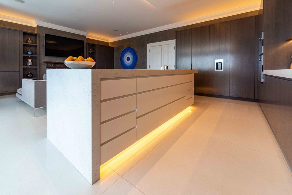 Chamber Furniture contemporary Kitchen with stained oak cabinets and white quartz worktop