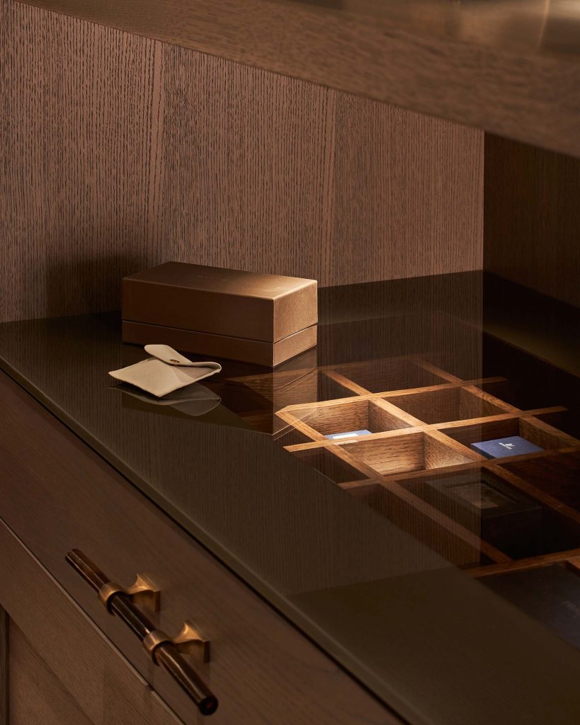 The master dressing room, part of a whole house project, is simple yet sophisticated. The furniture has been scaled to the space, with the wardrobes going full height to the ceiling and finished with the deep plaster room coving running around the face of the furniture. The oak has been stained to create a warm dark and elegant tone.